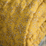 Yellow and White Floral Quilt